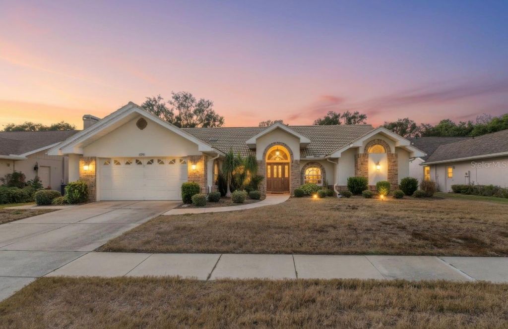 Photo of 1091 Tournament Drive, Spring Hill, FL 34608 (MLS # W7880793)