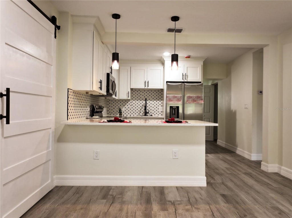 Photo of 919 W Hiawatha Street, Tampa, FL 33604 (MLS # TB8542464)