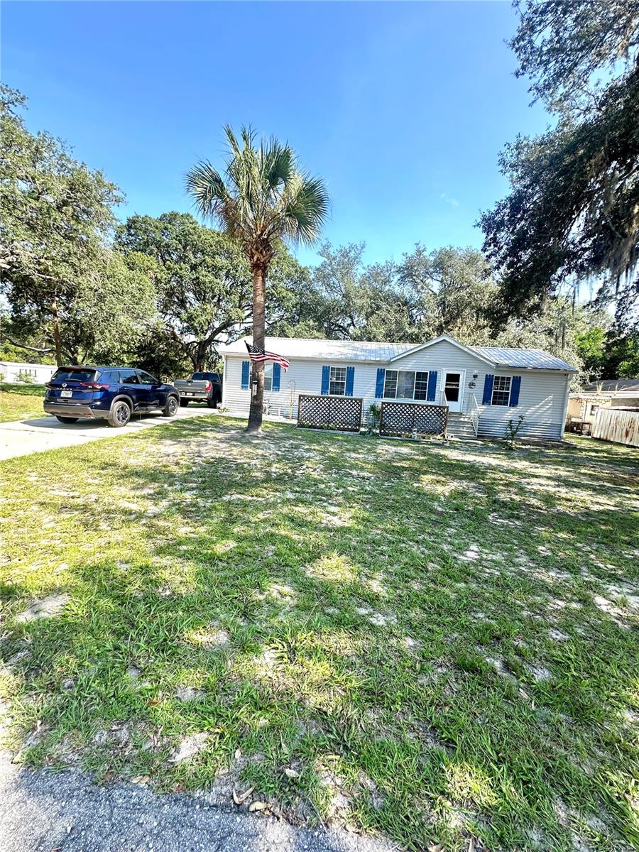 Photo of 202 Ash Street, Interlachen, FL 32148 (MLS # OM730564)