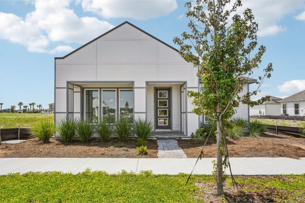 Receive up to $20,000 in Closing Costs! Discover this beautifully designed home in Weslyn Park, inspired by Ashton Woods’ Minimalist Collection and crafted with both style and efficiency in mind. Featuring a rare garage apartment and solar panels, this home combines modern convenience with sustainable living. Inside, enjoy wood floors throughout and a gourmet kitchen with designer finishes, perfect for everyday living and entertaining. Situated directly across from the community dog park, this home is part of a vibrant master-planned community offering a resort-style pool, playgrounds, walking trails, and more. With energy efficiency at its core and located in a rapidly growing area, Weslyn Park offers not only a stunning home but also a smart investment in the future.