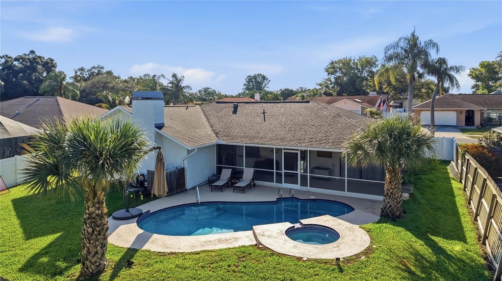 Photo of 4957 Lake Valencia Boulevard E, Palm Harbor, FL 34684 (MLS # TB8509461)