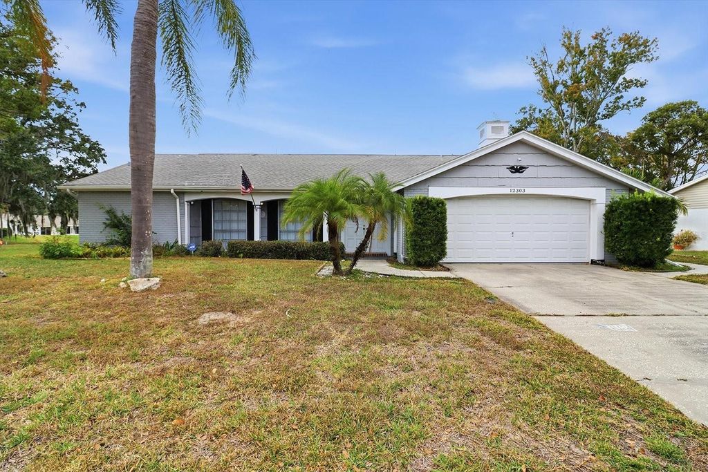 Photo of 12303 Fieldstone Lane, Hudson, FL 34667 (MLS # TB8452878)