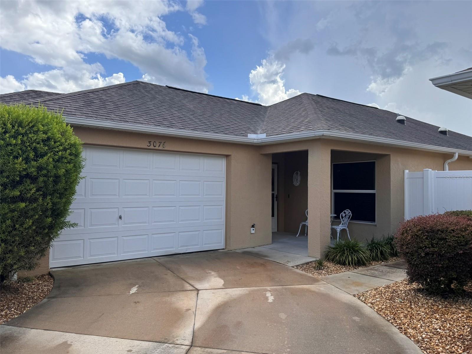 Long-term Annual Lease. Beautifully furnished and move-in ready. Welcome to 3076 Gulfport Ct in The Villages. This 2-bedroom, 2-bathroom home is nestled in the sought-after Village of Pinellas and offers a bright, open floorplan with vaulted ceilings, neutral finishes, and abundant natural light throughout. The spacious kitchen features upgraded cabinetry and a cozy dining nook, while the living area flows seamlessly to a screened lanai—ideal for morning coffee or evening relaxation. The primary suite includes a generous walk-in closet and an ensuite bath with dual sinks and a step-in shower. The garage has enough room for one car and a golf cart as well as a washer and dryer included with the home. Conveniently located close to Palmetto Executive Golf Course and Big Cyprus Recreation Center with pool and pickleball courts. Lawn care, pest control, water, sewer, trash and amenities fees included with rent. Seeking high-quality, long-term tenants. Temporary lifestyle resident IDs are not included in rent or fees and must be purchased separately upon arrival. The cost is $50 for two IDs paid to The Villages. We will complete all required documents and applications for ID cards.
