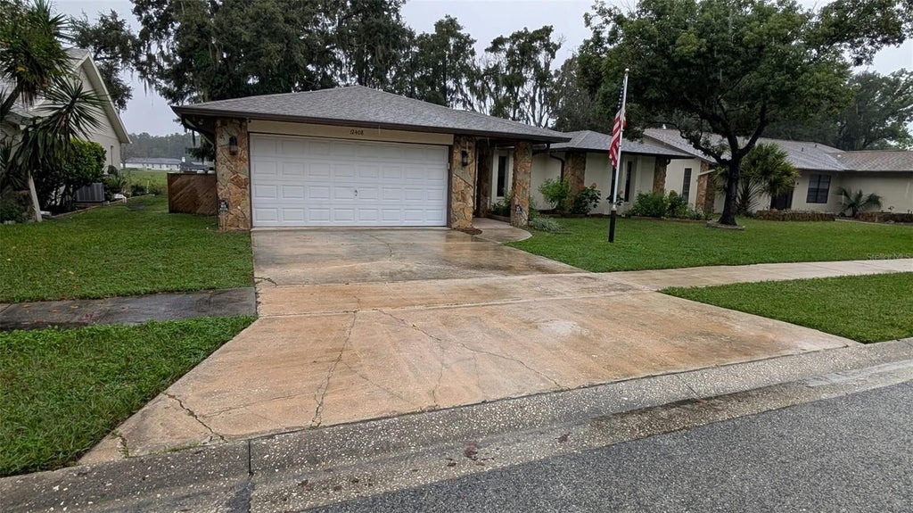 Photo of 12408 Golden Oak Circle, Hudson, FL 34669 (MLS # TB8557179)