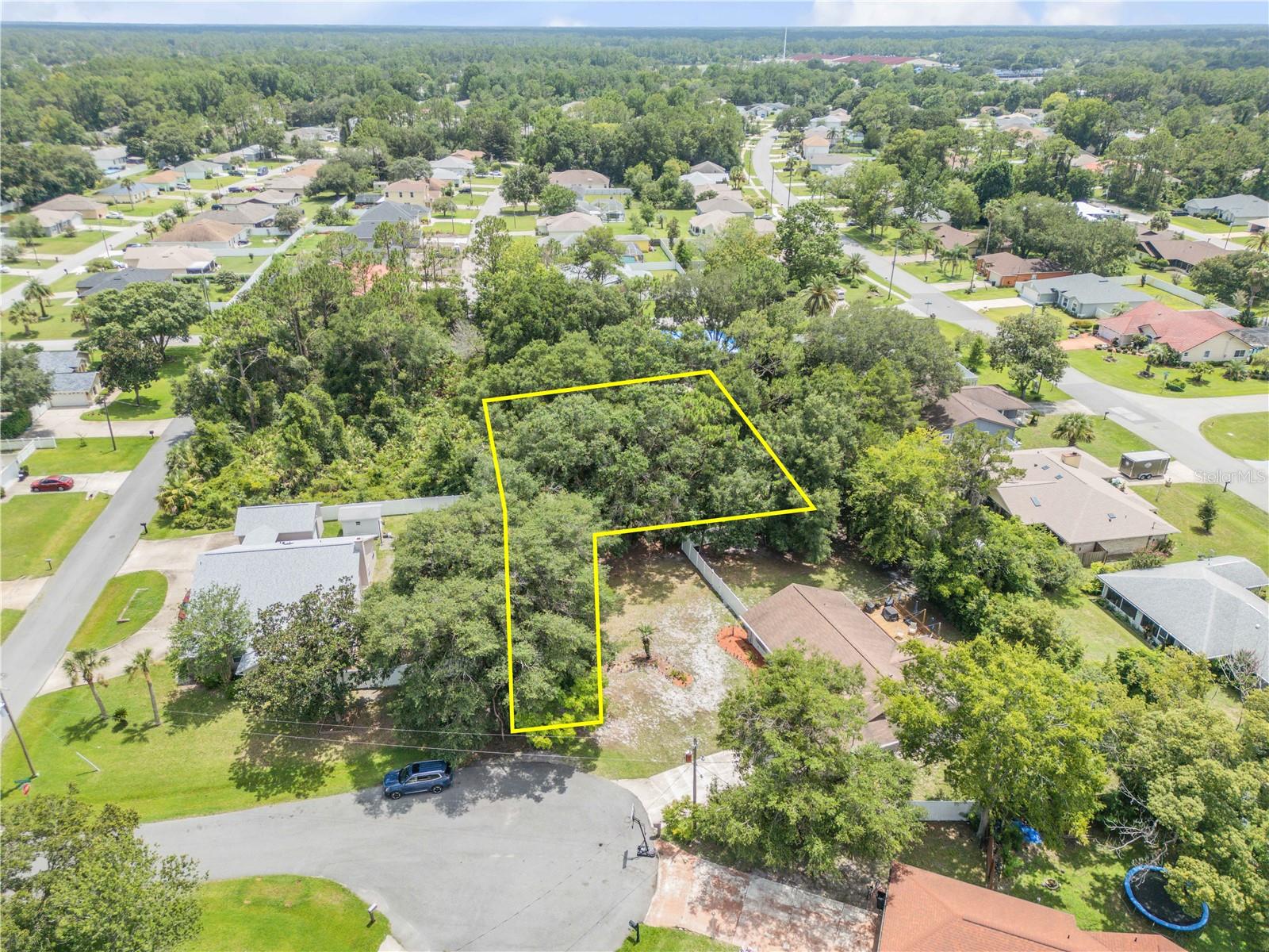 Discover the perfect spot to build your dream home on this spacious .38-acre lot tucked away on a quiet cul-de-sac in beautiful Palm Coast, Florida. This property offers a peaceful setting with added privacy, thanks to its location at the end of the street—ideal for anyone seeking a quiet, low-traffic environment. Surrounded by nature and established homes, the lot provides ample room for a custom residence. With no HOA, you have the flexibility to design a space that suits your needs and lifestyle. Convenience is a major draw here. You're just minutes from local restaurants, shopping centers, and grocery stores, making errands and dining out easy. Quick access to major highways puts everything within reach, whether you're commuting or exploring the surrounding area. And when it's time to unwind, you're only a short drive from the coastline and beautiful beaches—perfect for weekend getaways or daily sunset strolls. Whether you're planning your forever home or an investment property, this lot offers a rare mix of privacy, space, and convenience in one of Palm Coast’s desirable neighborhoods. Don’t miss your chance to own a piece of this growing community—reach out today to learn more.