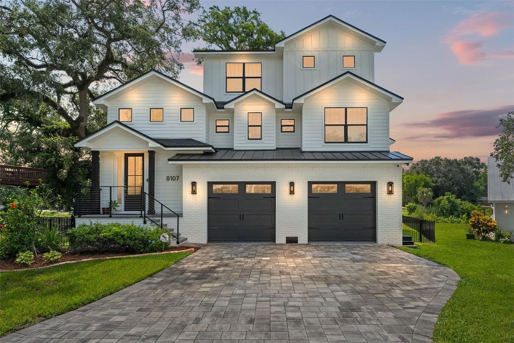 Photo of 8107 N River Shore Drive, Tampa, FL 33604 (MLS # TB8405355)