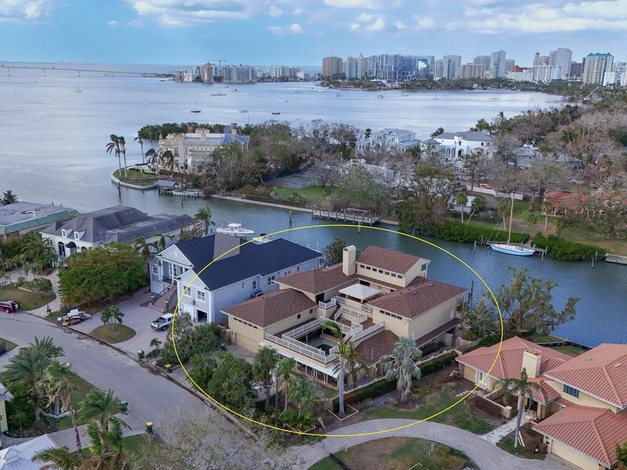 HARBOR ACRES Large, deep, sailboat canal with a view of the bay. Oversized dock 60ft x 8ft to accommodate a large yacht. 16,575sf ft lot with 118 feet of seawall! Current house is 6,946sf living area and you can possibly remodel this huge home with a brand new roof! Harbor Acres is the best neighborhood in Sarasota. It is located just a few minutes to downtown, Lido Beach, St Armand's circle and Siesta Key. Come build your dream house on this valuable Harbor Acres lot! Property flooded from Hurricane Helene and Hurricane Milton and is subject to the 50 FEMA rule. This listing is also the same property as A4628522