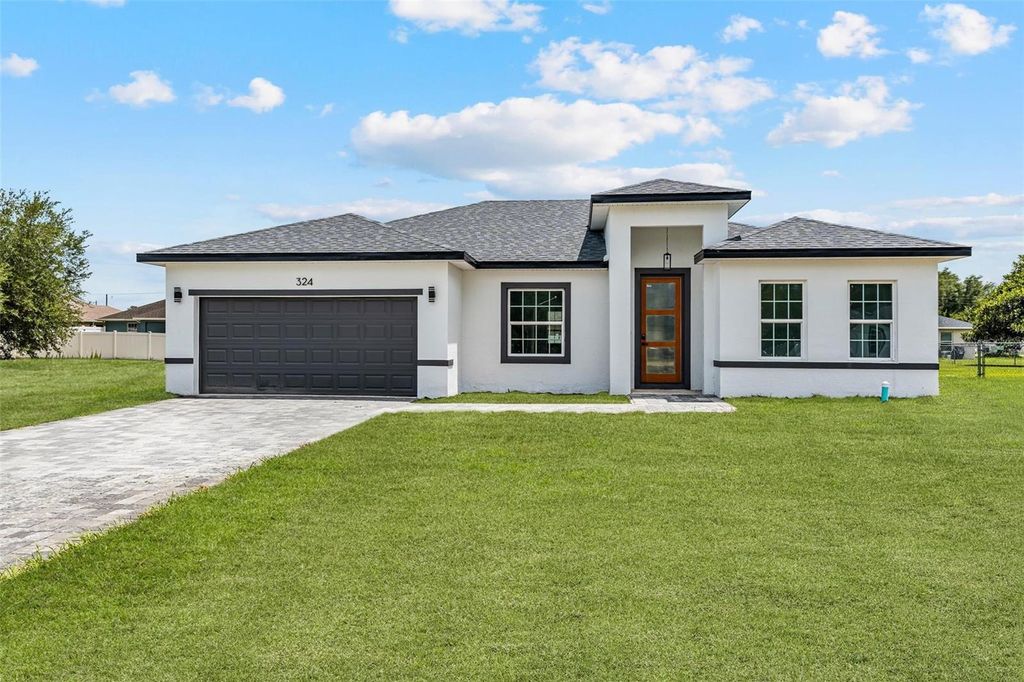 Photo of 324 Marion Oaks Trail, Ocala, FL 34473 (MLS # O6325378)
