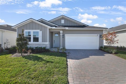 Photo of 200 Enclave Avenue, Palm Coast, FL 32164 (MLS # S5139802)