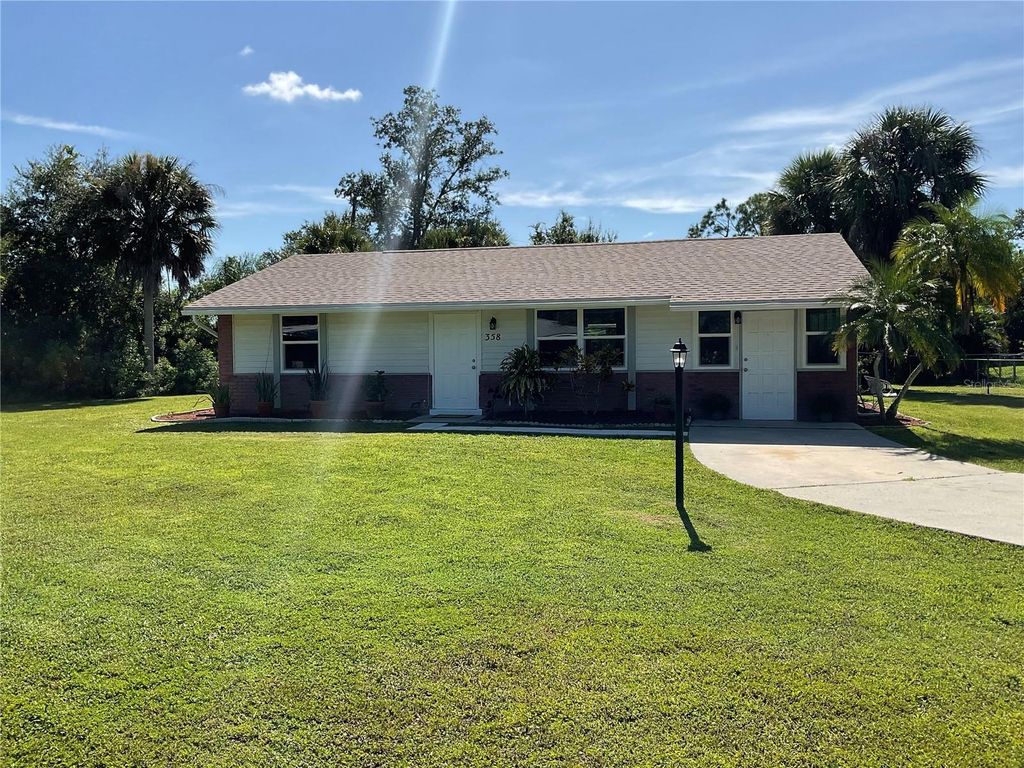 Photo of 358 Yeager Street, Port Charlotte, FL 33954 (MLS # C7514799)