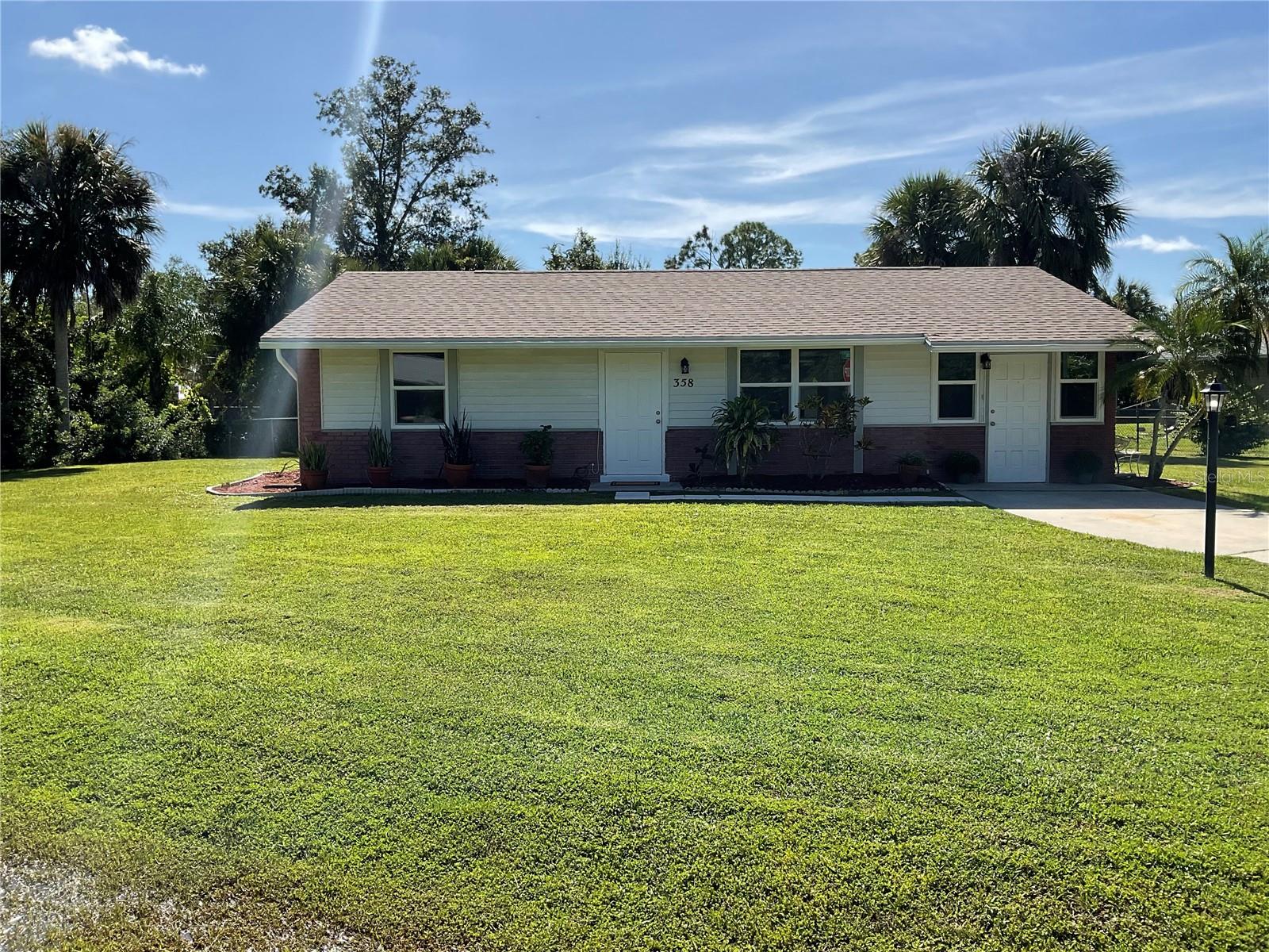 Welcome to this beautifully updated 1975 single-family 2 bedroom 1.5 bath pool home, perfectly situated on an oversized lot!
This home offers peace of mind with numerous recent updates, including:
• All new appliances (refrigerator, range, dishwasher, disposal, sinks, vanities, faucets, washer, and dryer)
• Hurricane-impact windows (2025) and a new hurricane-rated French door (2025) with shutters for the remaining exterior doors
• Updated electric panel (2015) and a newer roof
• Brand-new hot water heater (2025) and re-plumbing (2006)
Inside, you’ll love the refreshed kitchen featuring new cabinets, countertops, and backsplash. The home also boasts new laminate flooring and fresh interior paint throughout, creating a modern, move-in-ready feel.
Step outside to your private backyard oasis—complete with a sparkling pool, full fencing for privacy, and a storage shed for convenience. It’s the perfect setting for entertaining, relaxing, or enjoying time with pets.
All of this comes with an unbeatable location: just 30 minutes to the Gulf beaches, 25 minutes to CoolToday Park (Atlanta Braves Spring Training), and 10 minutes to Charlotte Sports Park (Tampa Bay Rays Spring Training).
This home combines comfort, style, and the best of Florida living—don’t miss it!