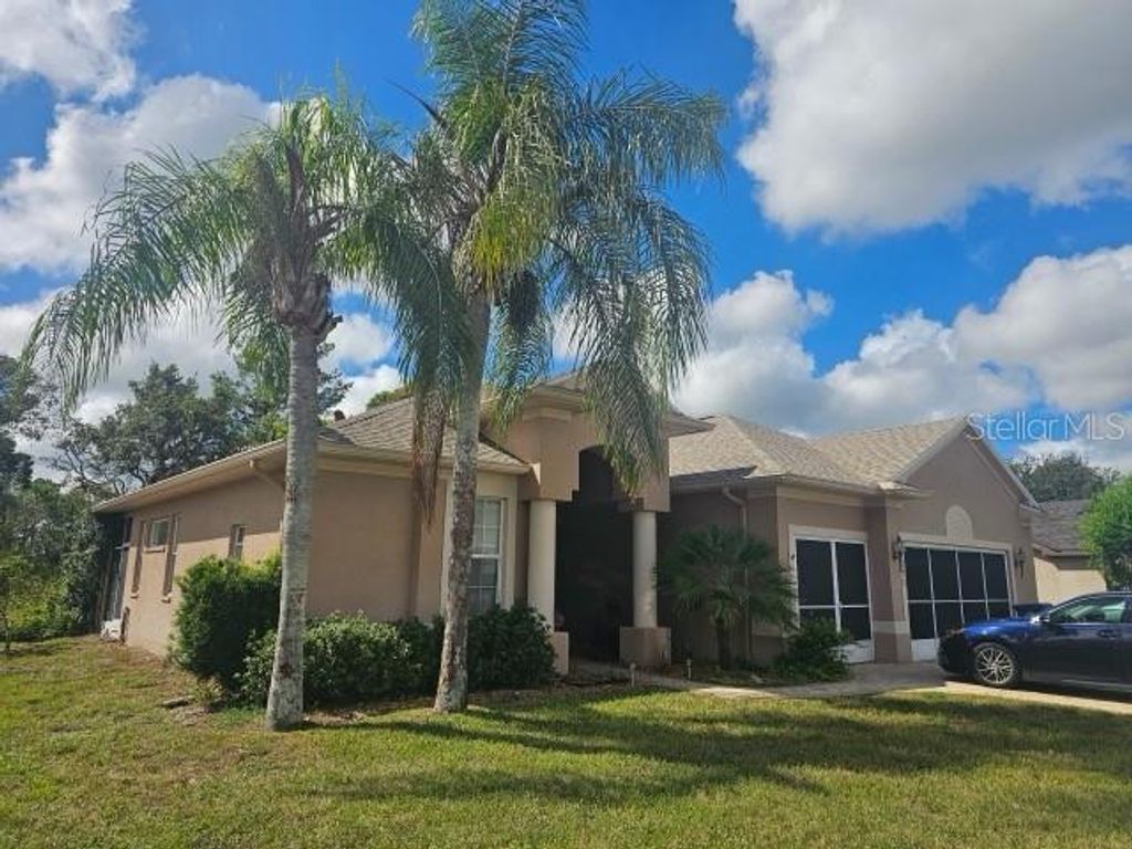 Photo of 11250 Avalon Way, Spring Hill, FL 34609 (MLS # TB8435623)