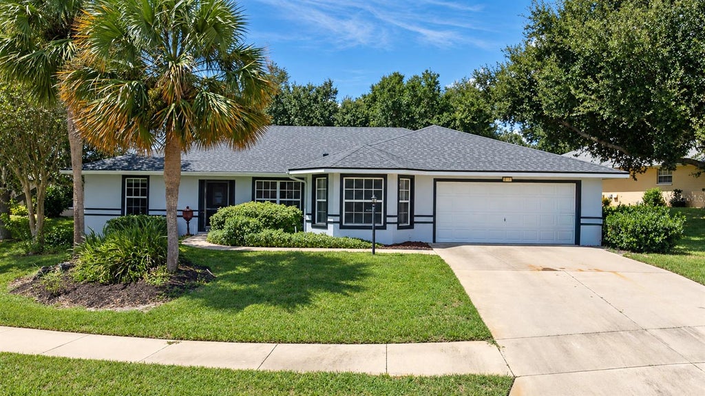 Photo of 26939 Honeymoon Avenue, Leesburg, FL 34748 (MLS # O6443840)