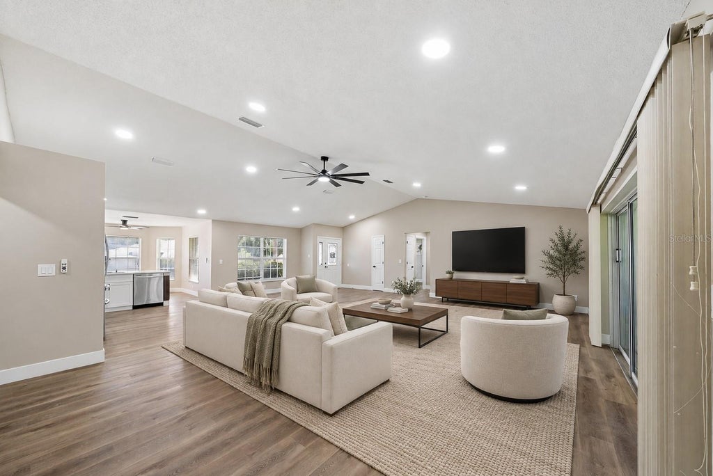 Photo of 26939 Honeymoon Avenue, Leesburg, FL 34748 (MLS # O6443840)