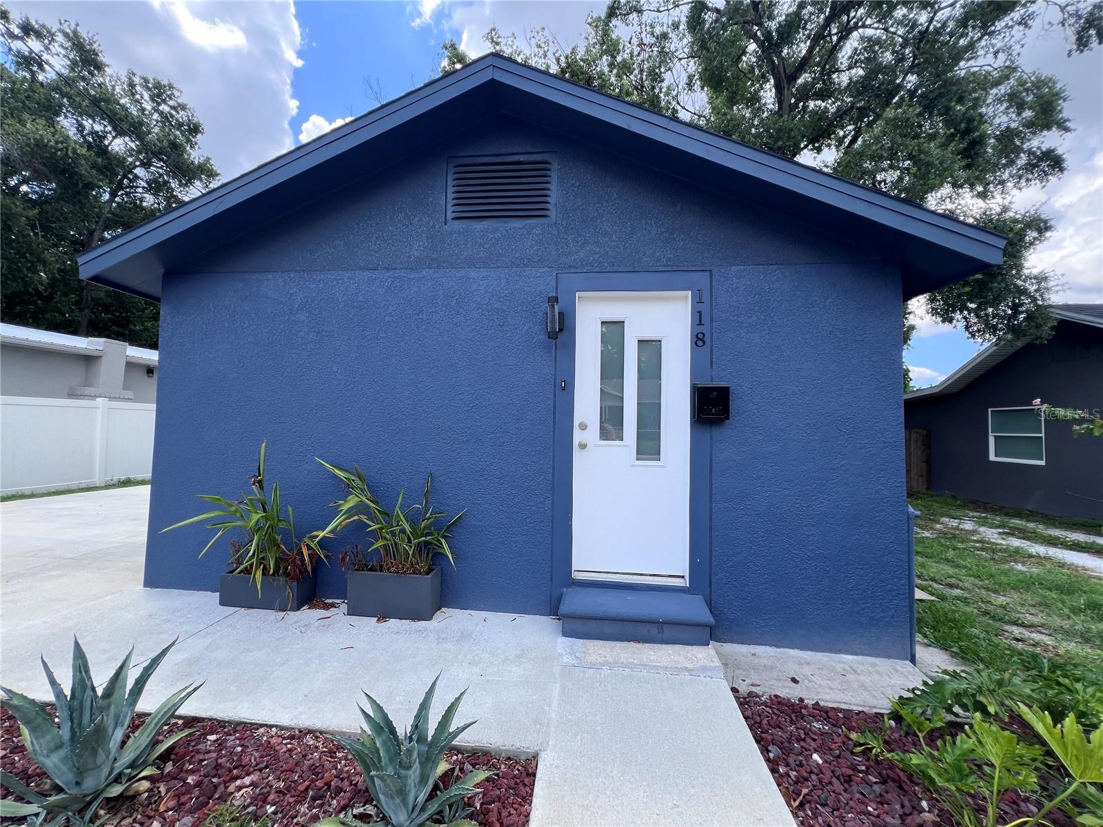 Live in the heart of desirable Seminole Heights! This charming 2BR/1BA home also includes a versatile bonus room that can be used as a flex space, home office, or even a THIRD BEDROOM. Inside, you’ll find easy-to-maintain tile flooring throughout, and an updated kitchen featuring quartz countertops, a bright subway tile backsplash, stainless steel appliances, and plenty of cabinet and drawer space—including deep pots-and-pans drawers for all your cooking essentials. The bathroom features a large walk-in shower and a storage closet for extra functionality. Outside, enjoy a fully fenced backyard—perfect for pets, entertaining, or relaxing in private—plus a large parking pad with room for multiple vehicles. A brand-new washer and dryer are included, and water and electric are covered in the rent, making this home as budget-friendly as it is comfortable. Just minutes from trendy restaurants, coffee shops, breweries, shopping, medical facilities, and downtown Tampa, this home blends comfort with one of Tampa’s most vibrant neighborhoods—don’t miss it!