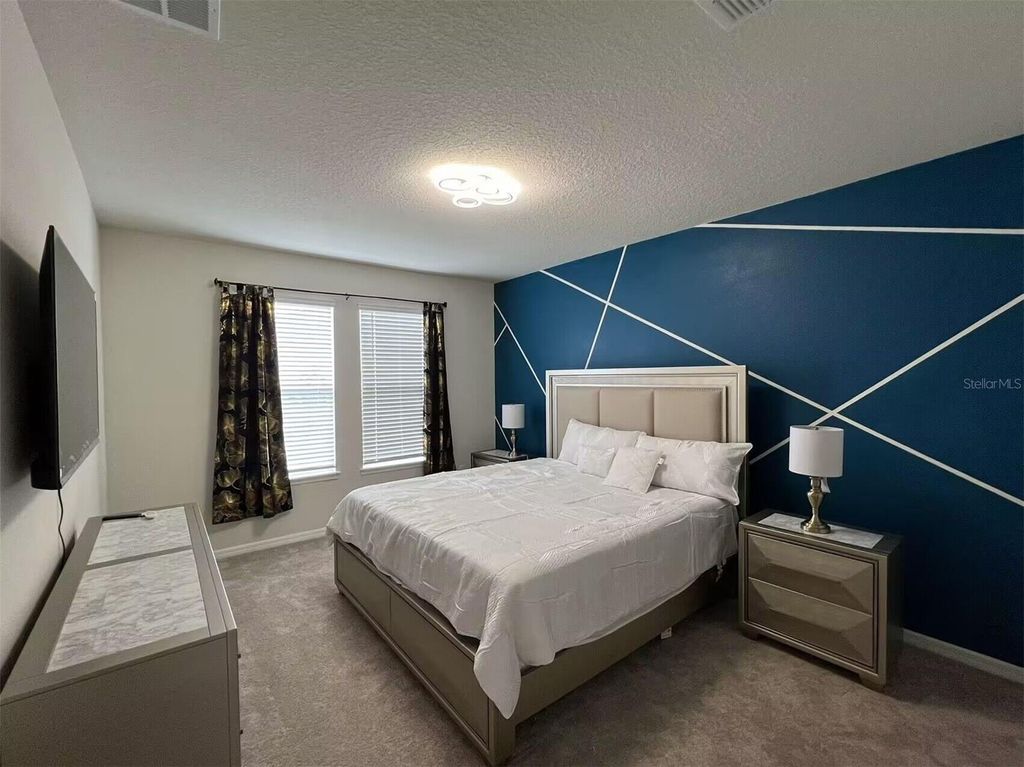 Photo of 3012 Mahalo Drive, Davenport, FL 33897 (MLS # O6321864)