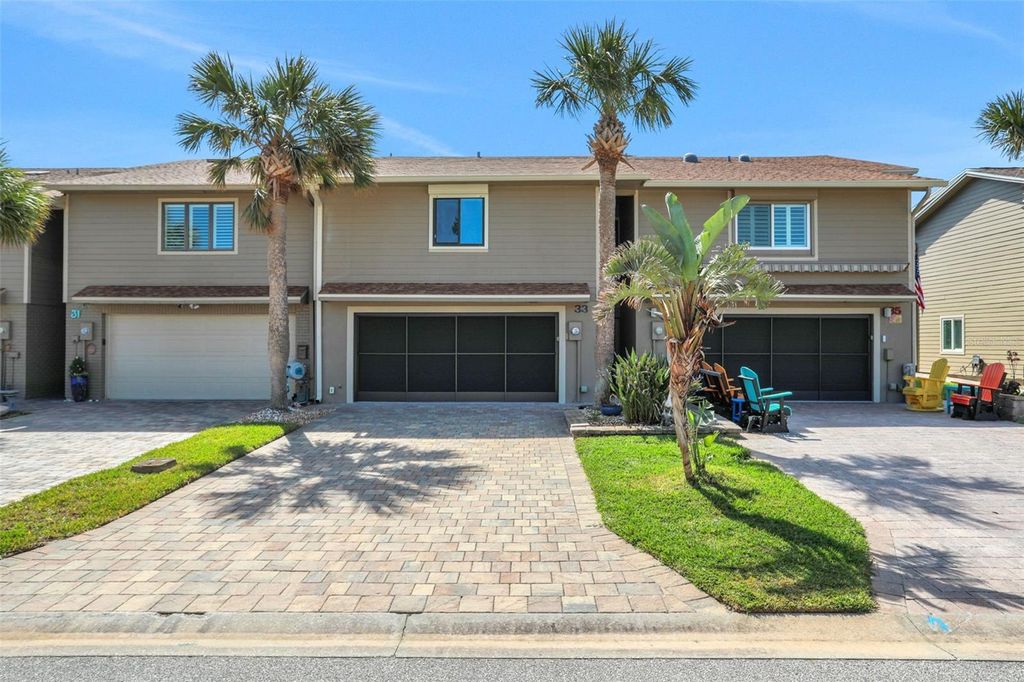Photo of 33 Sea Haven Drive, Ponce Inlet, FL 32127 (MLS # O6423837)