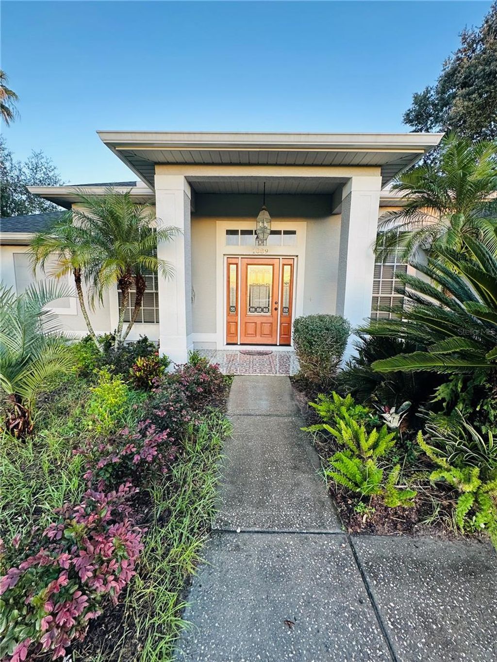 Photo of 1889 Ranchland Trail, Longwood, FL 32750 (MLS # V4945399)
