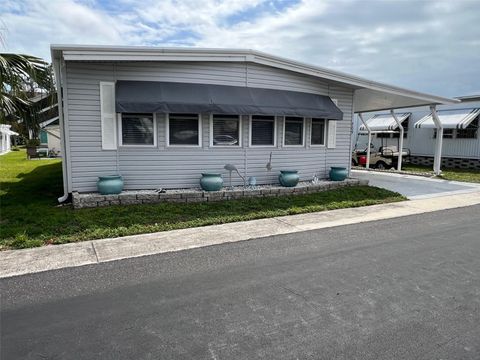 Photo of 709 Sugar Palm Street, Largo, FL 33778 (MLS # TB8365261)