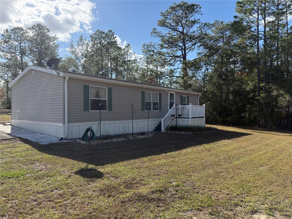 Photo of 6820 W Mable Lane, Dunnellon, FL 34433 (MLS # G5105850)