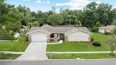 Photo of 14011 Wolcott Drive, Tampa, FL 33624 (MLS # TB8529329)
