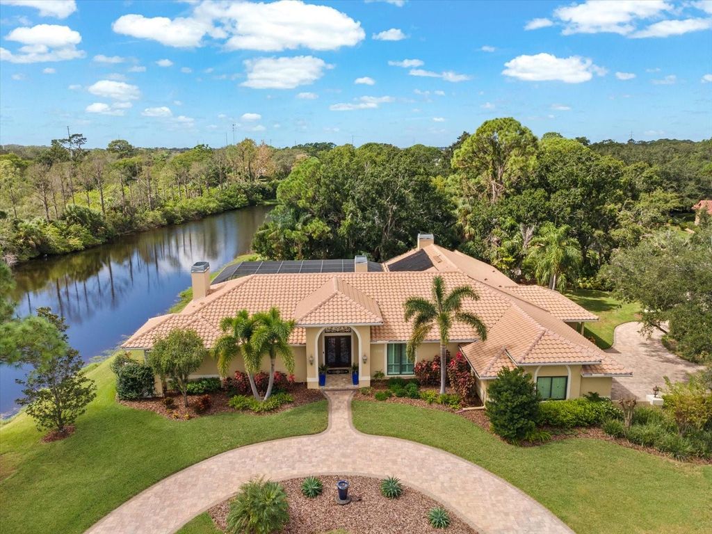 Photo of 1566 Mary Lane, Tarpon Springs, FL 34689 (MLS # W7879656)