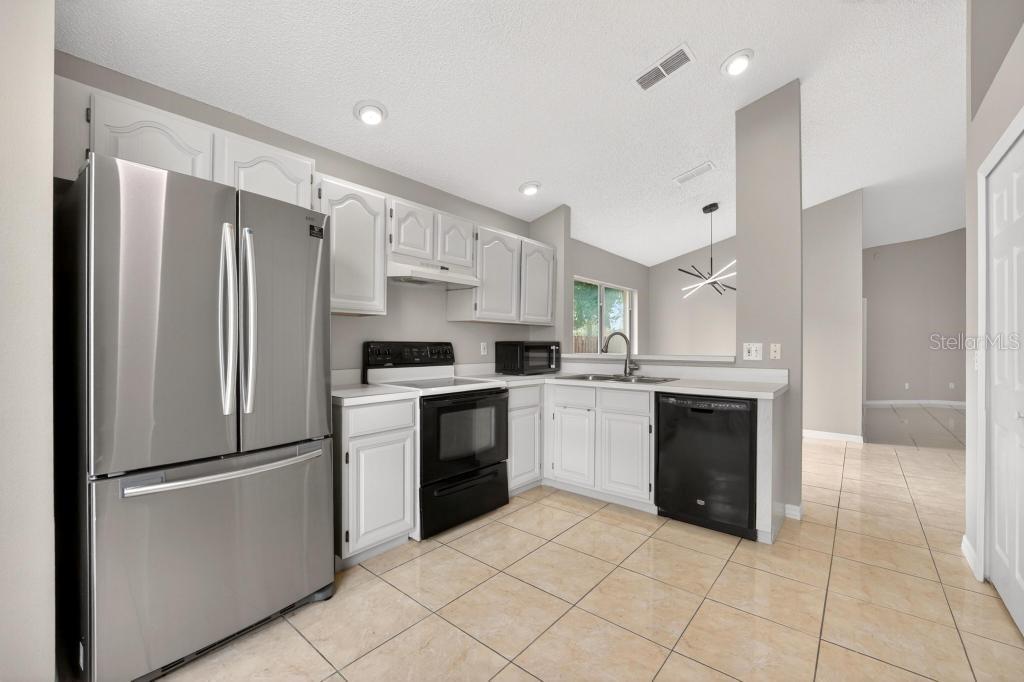 Photo of 2674 Newbolt Drive, Orlando, FL 32817 (MLS # O6416094)