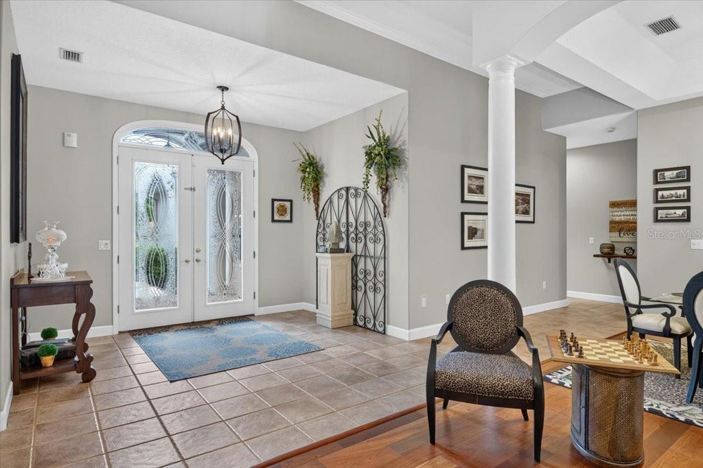 Photo of 3874 Crescent Cove Place, Tarpon Springs, FL 34688 (MLS # TB8528562)