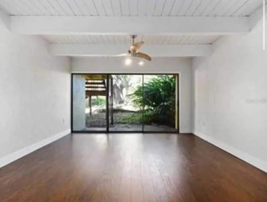 This tranquil, first-floor condo unit soaks up bright, natural light, and its location within the neighborhood provides easy access to one of two community pools and boat docks. This condo features brand-new flooring, along with a newer A/C unit, microwave, and stove. As soon as you enter, you are greeted by a gorgeous, airy vaulted ceiling that amplifies the beauty of the space. The stylish and functional kitchen design creates a warm, relaxing feel while still providing ample storage to suit your needs. The La Costa Brava community is located in the SoDo District of Orlando, and is close to: Foxtail Coffee, Club Pilates, Cypress Grove Park, Publix, and Neighborhood Walmart. It is also only a ten-minute drive to the Dr. Phillips Center for the Performing Arts. Here you’ll enjoy the perks of lakeside living such as kayaking and paddle boarding in Lake Pinelock. There are a plethora of nearby eateries and plenty of activities to enjoy year-round.