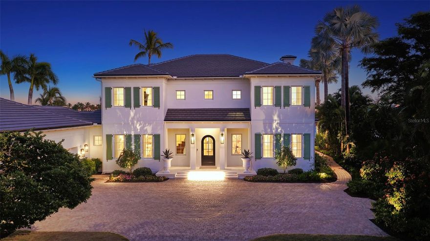 This bespoke crafted casually elegant furnished residence is in the exclusive gated Lighthouse Point waterfront enclave of just 16 custom residences at the southern tip of Longboat Key. Lighthouse Point is a peninsula nestled on a deep-water boat basin at the edge of the Intracoastal Waterway and New Pass. This residence has been completely remodeled within the past couple years, taken down to the studs to create the ideal coastal waterfront estate. The improvements included new impact glass windows and doors throughout and a new tile roof. The furnishings are chosen to make the space comfortable for both relaxing seaside living, as well as hosting family and guests. No detail has been overlooked. The first level includes an open floor plan with a living, family and dining room with a separate media room, and the fifth bedroom with double bunk beds for the little ones. Entering this stunning home, you are welcomed into a grand space, and beyond the beautiful kitchen with island seating, that includes the La Cornue French gas range as the focal point. The living and family rooms each have a gas fireplace. The main floor rooms overlook an expansive terrace and large heated pool with sun shelf chaises, back yard with plenty of space for games, private beach, and the Gulf of Mexico. Take the stately staircase or elevator to the second floor where the primary bedroom and three en-suite guest bedrooms are. The primary and two of the guest suites connect to a wide terrace overlooking the Gulf and Longboat Pass. Enjoy the Gulf’s vibrant sunset skies from the primary suite with spacious bedroom living space, meticulously appointed spa-like bath area, three walk-in closets and gas fireplace. There is a three-car side entry garage with room for storage. Down the street at the community dock is a new 16,000lb boat lift. Owners in the Lighthouse Point neighborhood enjoy their own tennis court plus the nearby gulf front beach, easy access to the Resort at the Longboat Key Club and the Links Golf Course and fitness center with famed St. Armand’s Circle shopping and dining district just over a mile away. Sarasota and its famed arts and entertainment is just 5 miles away. .