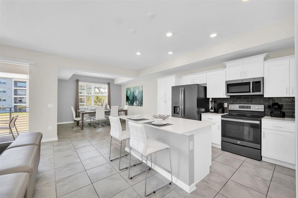 Photo of 3180 Paradox Circle #203, Kissimmee, FL 34746 (MLS # S5149384)
