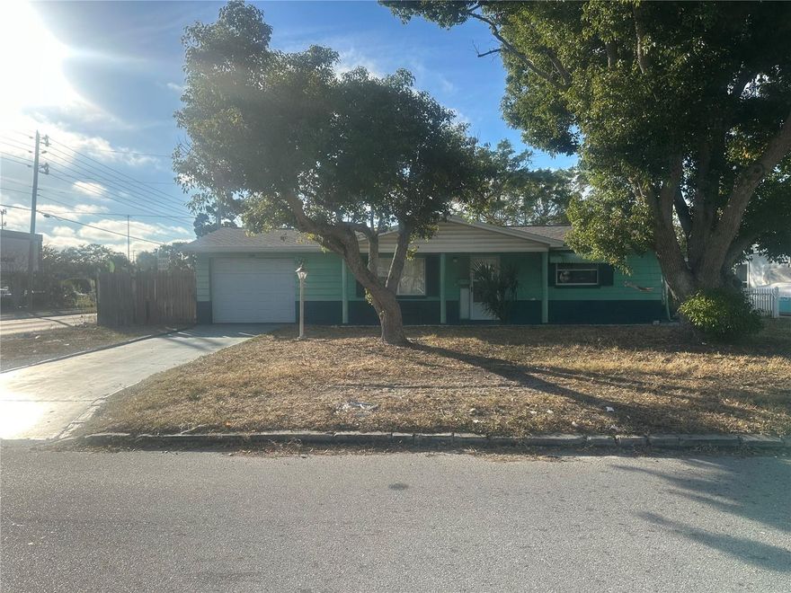 Perfect First-Time Home or Investment Opportunity!
Welcome to this COZY 2-bedroom, 2-bath home with a single-car garage on a large corner lot that is adjacent to a shopping plaza that you can literally walk across the street to. This home also has a generous size kitchen and enclosed back patio for more living space, and a large back yard for perfect for grilling out, entertaining with room for your kids or pets to play. The most significant cost features of this home has also been upgraded as well, ROOF in 2022, A/C in 2018, SEPTIC Replaced 2020, so need to worry about those for years to come.
This home is Full of opportunity and is ideal for Investors seeking a smart value-add to their portfolio or First-time Buyers looking for that first starter home that could later become an investment home or provide a down payment on the next property. Though it needs a touch of TLC, it provides you a great opportunity to create equity quickly by customizing it or making it your very own.
This home is in a Great location and sits in the midst of the thriving and active New Port Richey area, being only 2 blocks away from Hwy 19, makes it just minutes away from shopping, dining, local parks, and near the beautiful Simms Park with the Cotee River where there is also a boat ramp where you can get out to the beautiful gulf ocean water. It is also near hospitals, the Newer VA Clinic and other medical centers. Enjoying all of that, along with quick access to the Gulf Coast beaches, and being only about 45 minutes from Tampa International Airport makes it perfect for commuting for both business or pleasure,  like exploring city life, nature trails, kayaking or other water sports etc.
If you’ve been searching for an affordable property with real potential in a desirable, well-connected area, this is the one. Schedule your showing today!