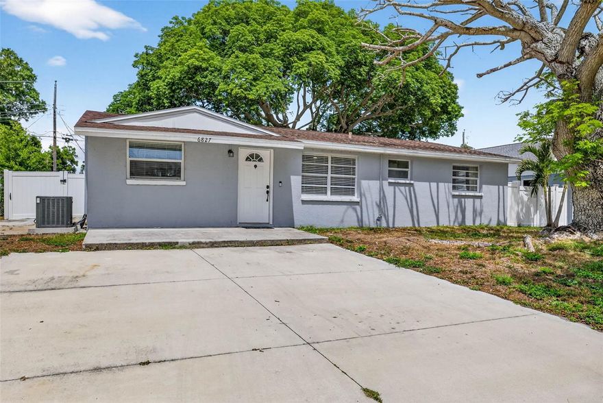 Move-in ready 3-bedroom, 1-bath home in desirable Pinellas Park! Recently updated, this 1,084 sq. ft. home offers a bright, open layout perfect for comfortable living and entertaining. The modern kitchen features granite countertops, shaker cabinets, and stainless-steel appliances, overlooking the spacious living area so you never miss a moment. The home also includes a convenient laundry area, vinyl wood plank flooring throughout, and a beautifully updated bathroom. Step outside to a large fully fenced backyard and covered porch—perfect for BBQs, gatherings, or playtime. Recent upgrades include a 2021 central air system, 2020 roof, and updated electrical. Situated in a no-flood zone and close to shopping, dining, and all that Florida has to offer—this home combines style, comfort, and convenience!