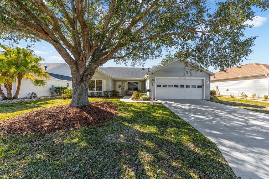 Photo of 8337 SE 176th Lawson Loop, The Villages, FL 32162 (MLS # OM717826)