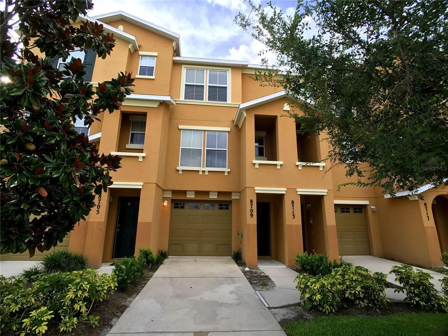 LOCATION, LOCATION, LOCATION! 1092 heated square feet with 2 bedrooms, 2 full and 1 half baths, this lovely three level town home lives and feels much larger than 1092 sq. ft. It boasts a 2-car tandem garage on the ground level, kitchen and living areas on second level and bedrooms on the third. The kitchen is conveniently situated between the spacious living room and formal dining room and features granite counter tops, plenty of cabinet space, stainless steel appliances and a spacious pantry. There's crown molding in the living and master bedrooms and flooring is top of the line wood laminate. Only the staircase is carpeted. The master suite has his and hers closets and plenty of room for a king sized bed. Sliding glass doors open into the balcony to the natural preserve giving you absolute and TOTAL PRIVACY. Sun bathe all day, take photos of birds or just sip your favorite beverage and enjoy nature. Enjoy the same delights from the balcony out of the formal dining room. Plus, stunning lake views greet you from the front end of the home, giving you two enviable views for the price of one. This will not last long as properties on Spruce Hills Ct rarely come on the market. Minutes from the mall at UTC, restaurants, and all the amenities that Lakewood Ranch offers. There is everything to love about this beautiful home. Grab it before it goes.