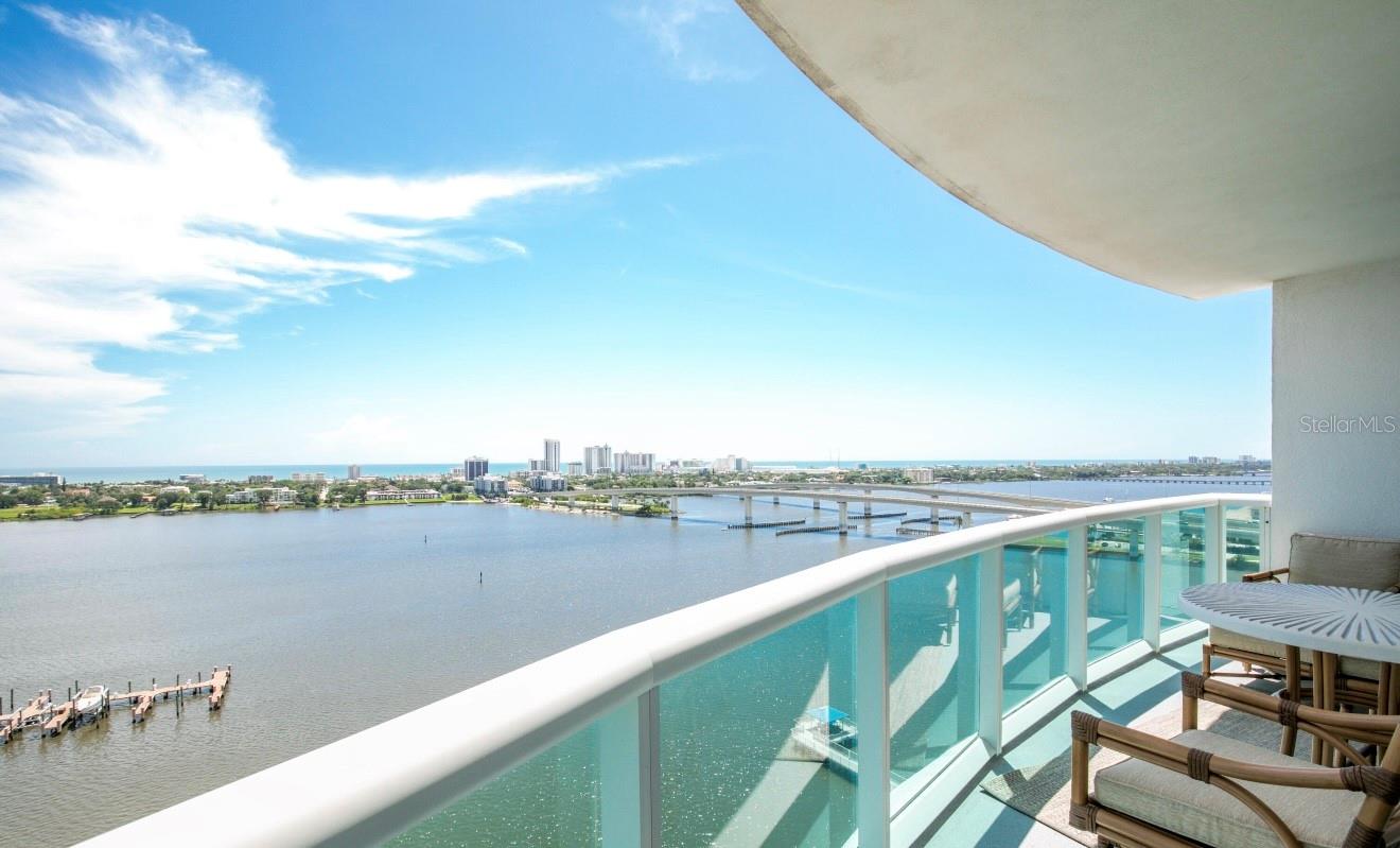 This stunning TURNKEY 16th-floor condo at Marina Grande has been meticulously remodeled with no expense spared. The 3-bedroom, 3-bath unit features a Viking cooktop, high-end LG kitchen appliances, and Samsung stacked washer/dryer. The kitchen boasts stunning Brazilian quartzite countertops with waterfall edges and matching backsplash. Enjoy panoramic views from this end unit, stretching from Flagler Beach to Ponce Inlet—perfect for morning coffee or evening relaxation.
The spacious open floor plan includes a luxurious master suite with marble bath, guest bedrooms with private baths, and a sleek great room with extraordinary ocean and river views. Over $50K in recent upgrades elevate this 2,300+ sq. ft. condo, ensuring a modern, elegant living experience.
Offered fully furnished with curated pieces valued at over $120,000, this home showcases designer furniture by Tommy Bahama and other luxury brands, creating a refined, turn-key residence ready for immediate enjoyment.
A prime covered parking space (#248) on the 2nd floor and storage unit #03-50 are also included for your convenience.
Enjoy maintenance-free waterfront living at the fabulous Marina Grande on the Halifax, where resort-style amenities and on-site luxuries mean you almost never have to leave the condo!