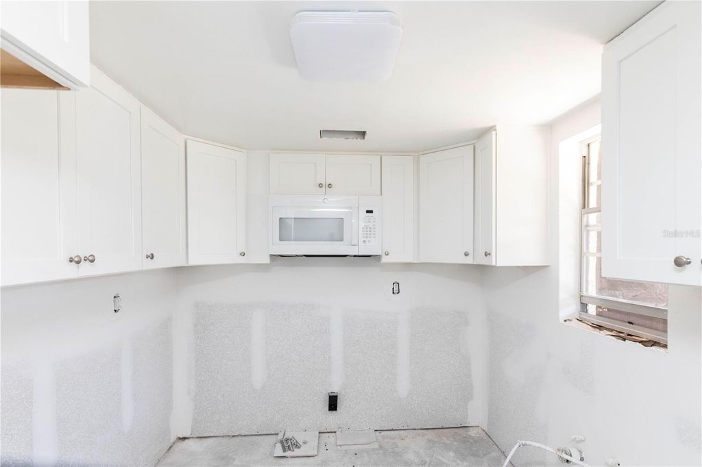 Photo of 4609 Marine Parkway #102, New Port Richey, FL 34652 (MLS # W7874620)