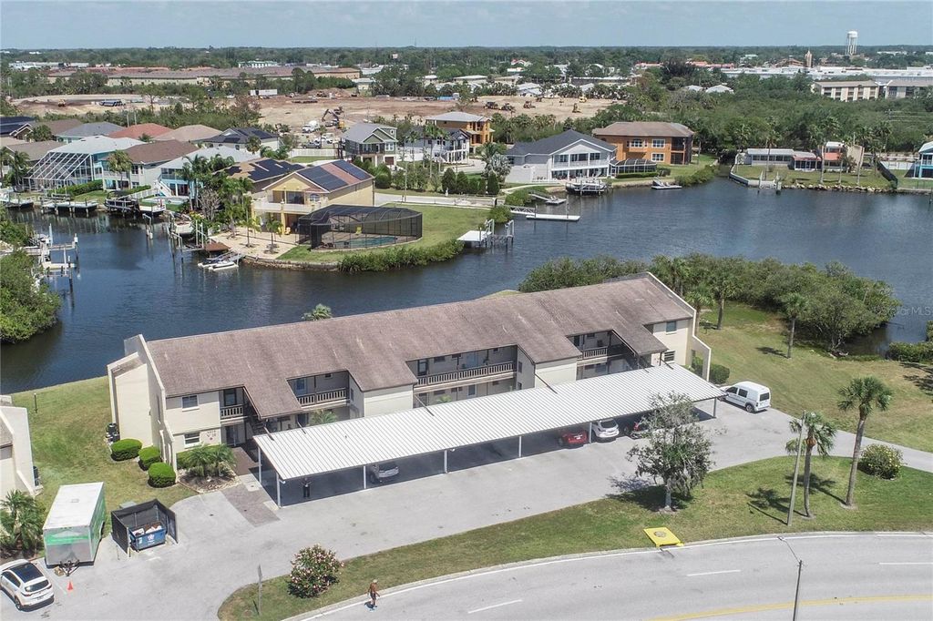 Photo of 4609 Marine Parkway #102, New Port Richey, FL 34652 (MLS # W7874620)