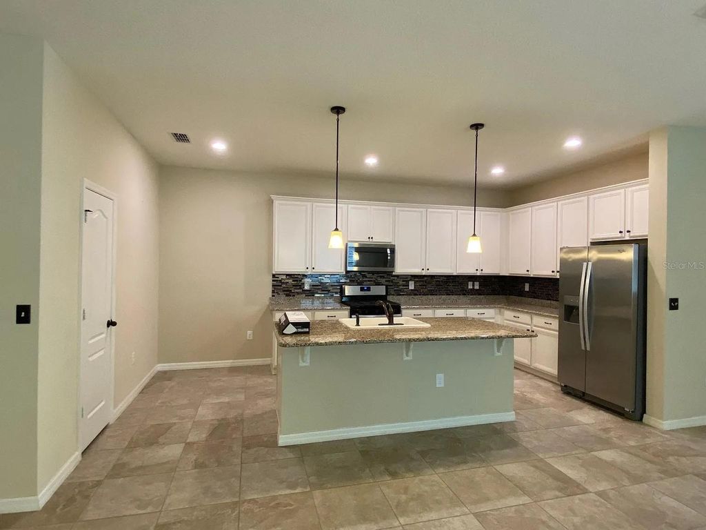 Photo of 14667 Bahama Swallow Boulevard, Winter Garden, FL 34787 (MLS # O6342795)