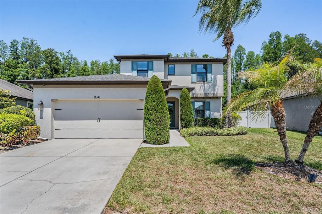 Photo of 19545 Post Island Loop, Land O Lakes, FL 34638 (MLS # TB8496352)