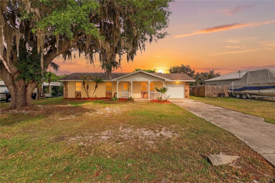 Welcome to this 3 bedroom, 2 bath pool home with NO HOA full of opportunity and charm. Featuring brand new luxury vinyl throughout, the roof replaced in 2021, and A/C replaced in 2020. The enclosed former screened porch adds valuable additional living space, and with a few modern touches, this home could truly shine. Enjoy your private fenced in backyard with a pool, making it ideal for relaxing and entertaining. This home is located minutes away from the Polk Parkway and Camp Margaritaville.