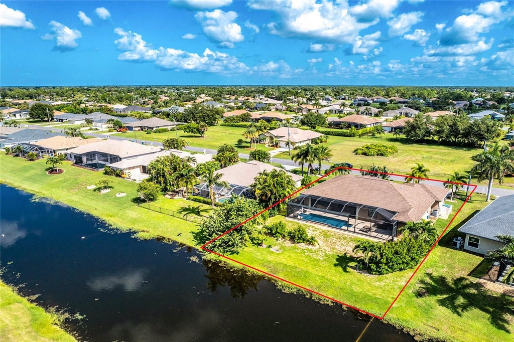 Photo of 4 White Marsh Lane, Rotonda West, FL 33947 (MLS # D6148265)
