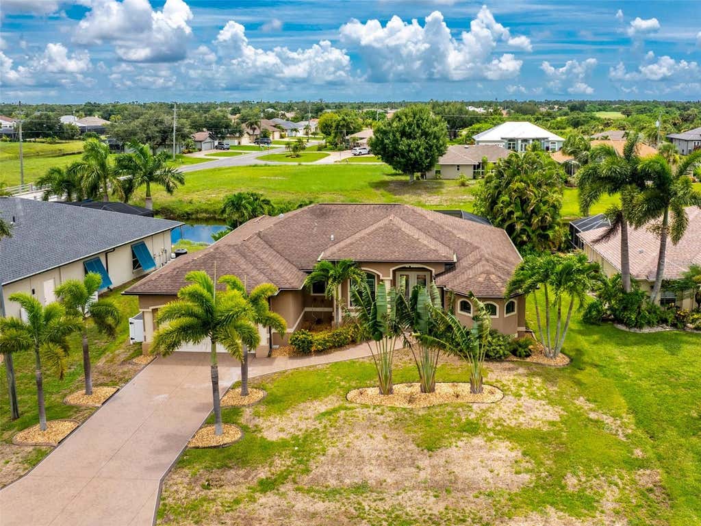 Photo of 4 White Marsh Lane, Rotonda West, FL 33947 (MLS # D6148265)