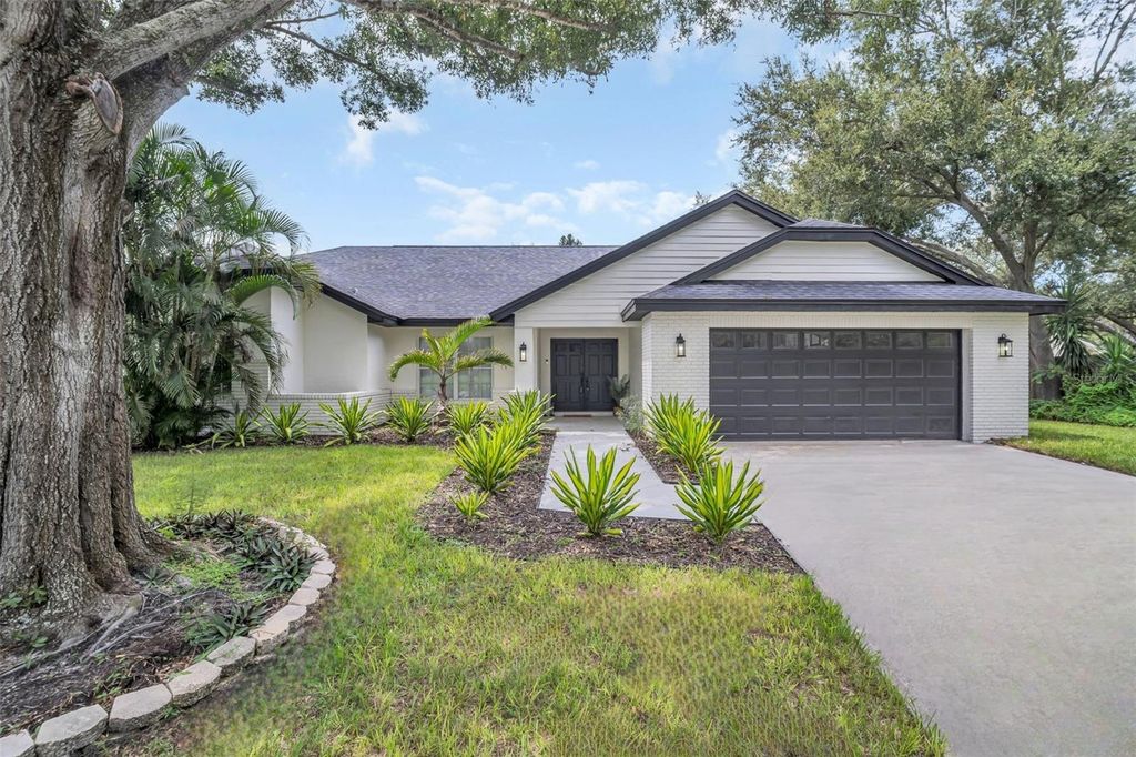 Photo of 2830 Resnik Circle W, Palm Harbor, FL 34683 (MLS # TB8417724)