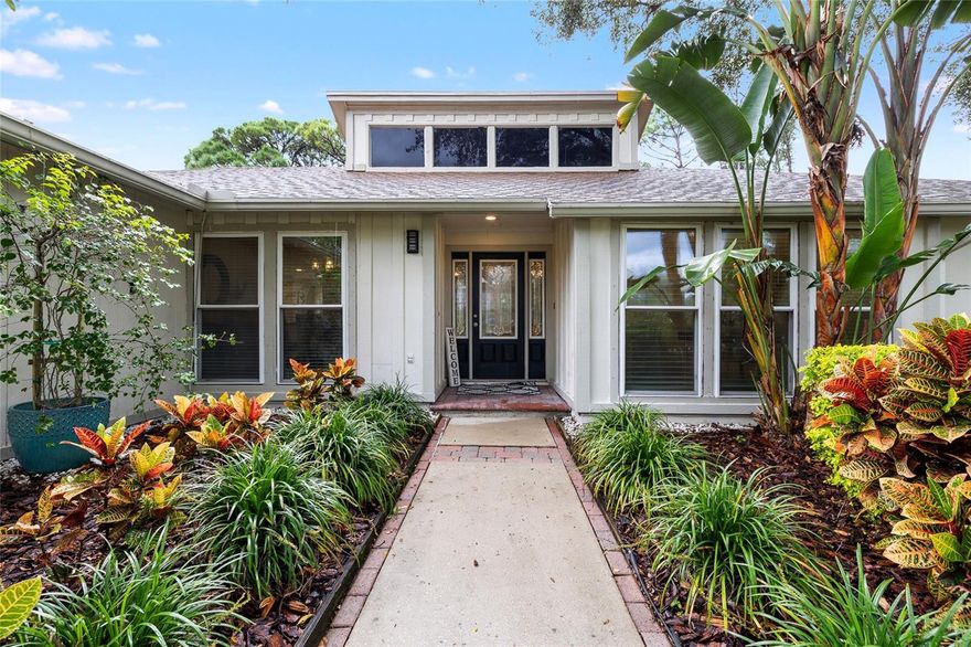 LOCATION, LOCATION, LOCATION! This beautifully updated 4 bed/ 3 bath/2 car garage pool home is located in the heart of Carrollwood Village. With Veteran's Expressway a Dale Mabry Hwy right around the corner, your daily commute is a breeze-20 min to Tampa International Airport, downtown Tampa and more. Tons of convenience with shopping, restaurants, grocery, medical, parks, and Carrollwood Country Club just minuet from the home.  With a full renovation and remodel in 2021 and many other recent updates and improvements including a new roof (2020). two new HVAC units (2021 & 2023), new hot water heaters (2018 & 2023), new windows and Primary Bedroom sliding door 2002, pool resurfaced (2021) and a new water meter installed (July 2025). This home offers piece of mind. Lovely Tree lined neighborhood is the perfect spot for all. The front of the home welcomes you with colorful lush landscaping. Step inside the home to find spacious rooms and lots of natural light, The Kitchen boasts a large center island with seating and ample storage. and is open to a cozy family room with full Pool Bath and sliders to the pool are area. The huge Formal Living Room and Dining Room are at the entry and center of the home. Three bedrooms and the Jack and Jill bath lead to the Private Primary Bedroom with huge Ensuite bath & two very LARGE WALK IN CLOSETS. One secondary Bedroom has its own separate sitting are for perhaps a playroom or in guest suite make your way outside to a screened lanai with covered seating areas and shimmering pool. And did we mention this home has one of the largest lots in Carrollwood village? Fully fenced with shade trees-great for, pets, gardening. Tis home has everything you need and so much more, come see it for yourself.