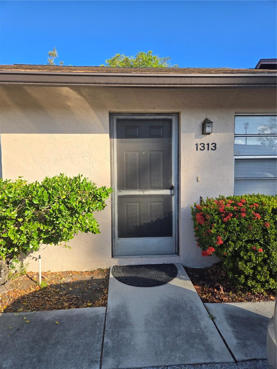 HUGE PRICE Reduction! First home, Second home or investment property..Come and Get It!! Owner Motivated. Updated 2 bedroom 1 bath condominium in quiet community. Ground Floor unit offers open living area with eat in kitchen. Kitchen has been updated with new sink, nice cabinets and granite countertops and updated backsplash. Light and bright unit with vaulted ceilings in Living area. Nice sized bedrooms with plenty of closet space. Bathroom has been updated including a new vanity, mirror and a new toilet. Features include a new tankless water heater, newer appliances, newer A/C unit and in unit laundry area located in separate closet on patio, giving you more space in the kitchen. Patio is very private and boasts a very tropical view. Easy access to SR 70, US 301 and I75. Buyer to verify rental restrictions with HOA, and County.