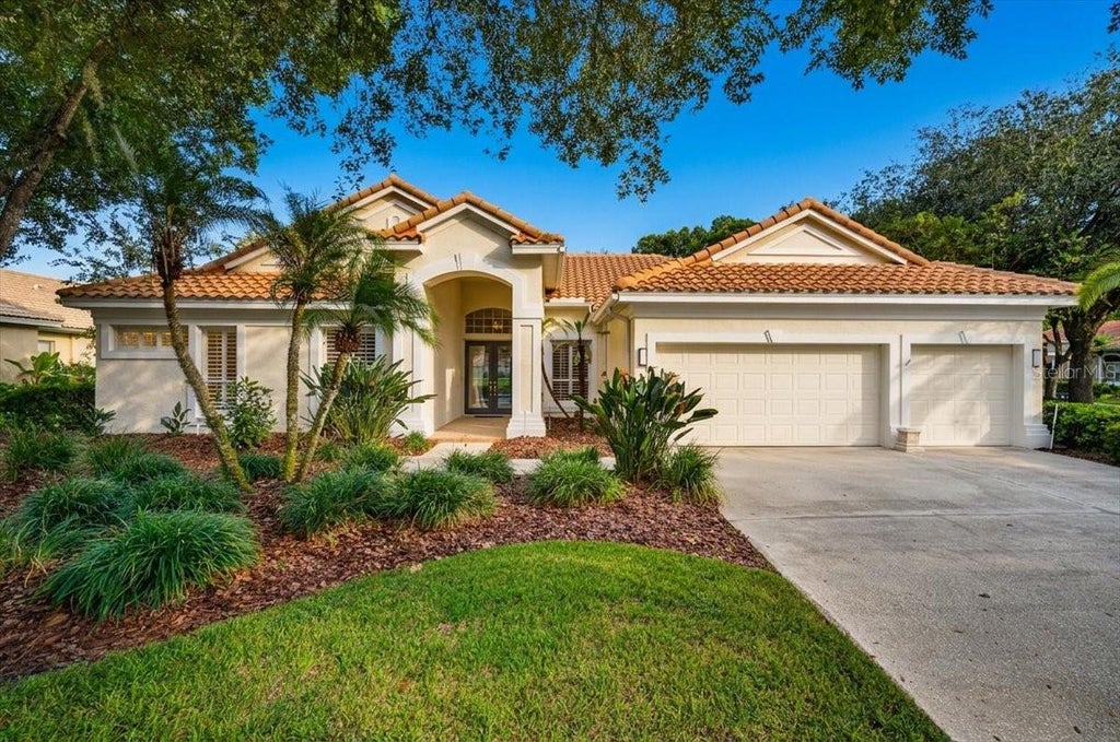 Photo of 9101 Woodridge Run Dr, Tampa, FL 33647 (MLS # TB8553405)