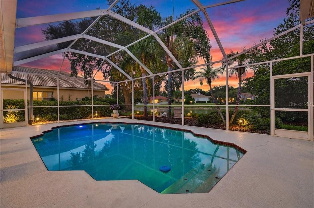 Photo of 9101 Woodridge Run Dr, Tampa, FL 33647 (MLS # TB8553405)