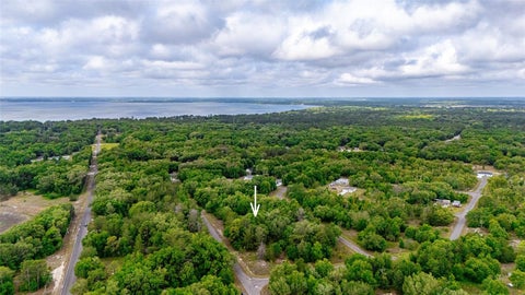 Photo of 15 Magnolia Drive, Ocklawaha, FL 32179 (MLS # TB8536399)