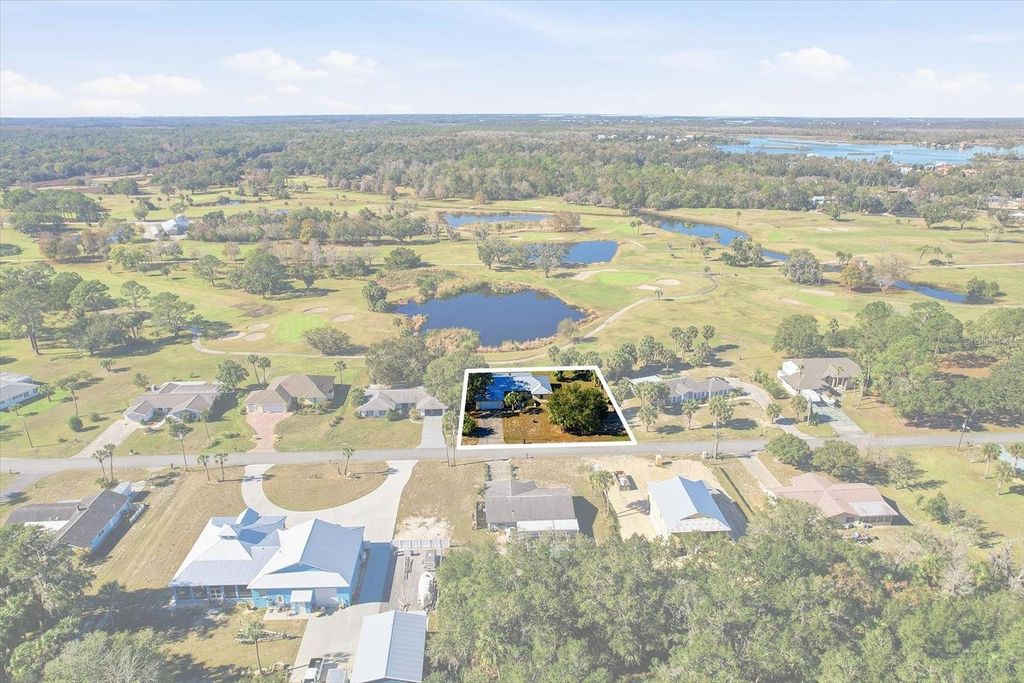 Photo of 870 N Country Club Drive, Crystal River, FL 34429 (MLS # TB8457110)